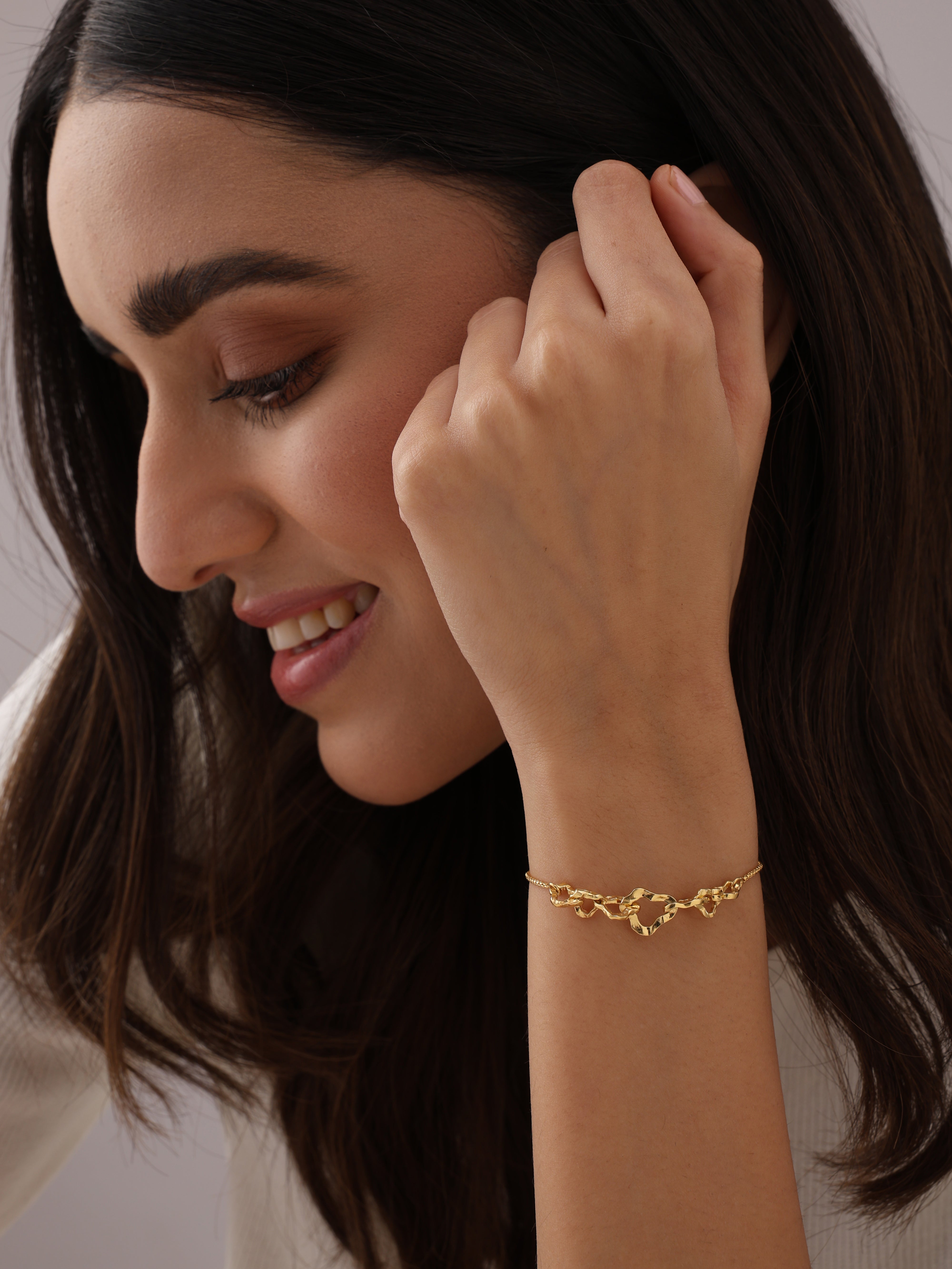 Amara Intertwined Hearts Adjustable Gold Bracelet