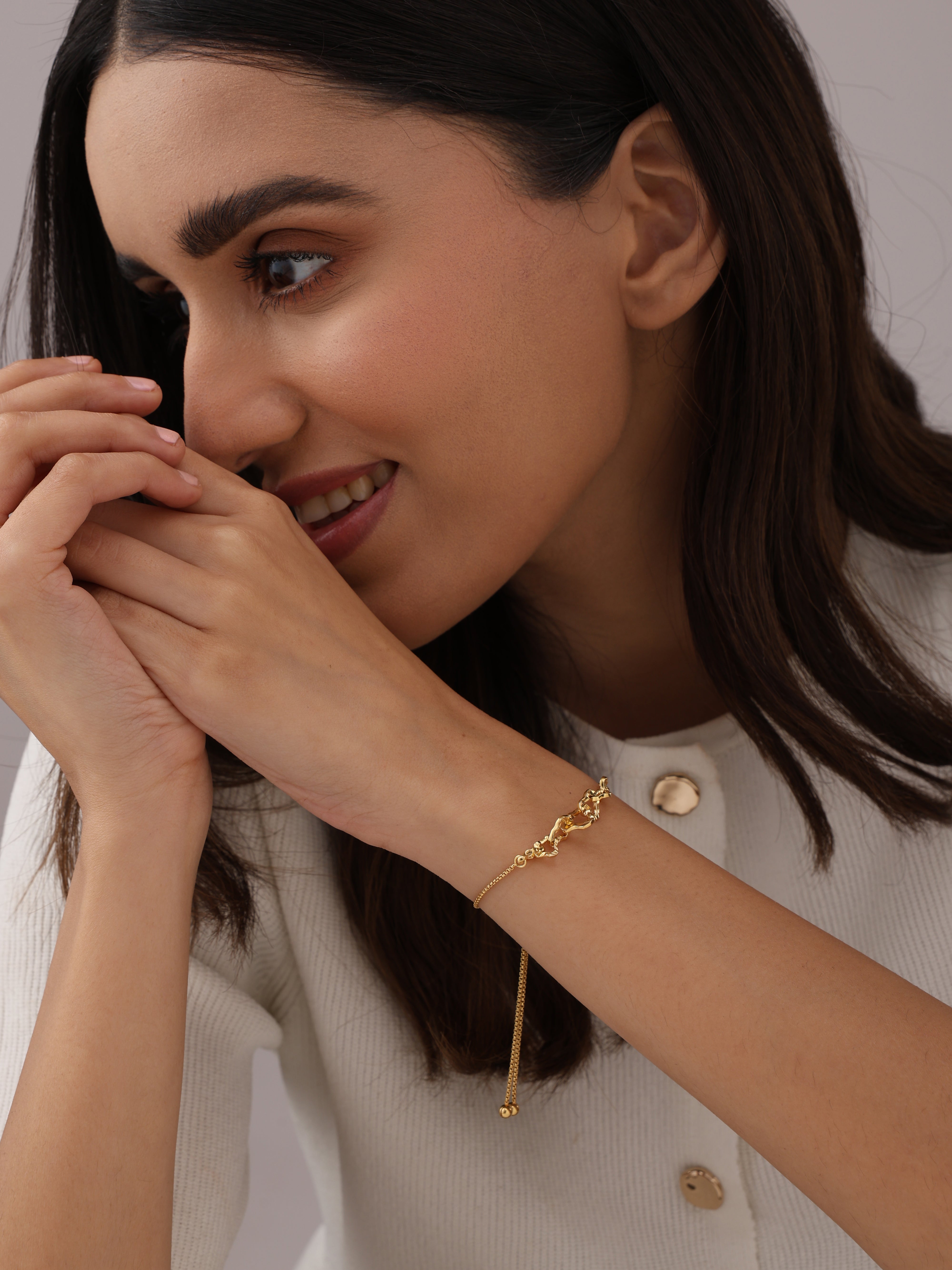 Amara Intertwined Hearts Adjustable Gold Bracelet