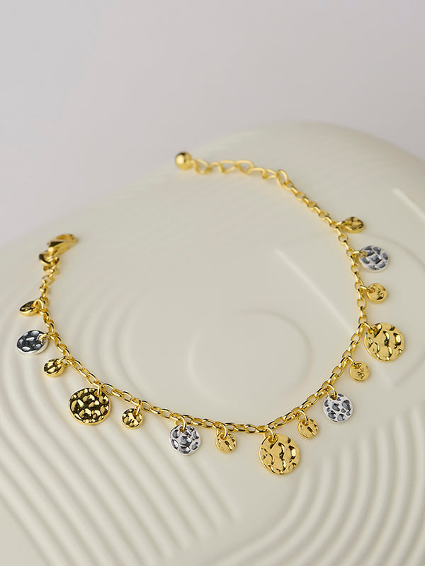 Radiant Rhythm Two-Tone Hammered Disc Silver Bracelet