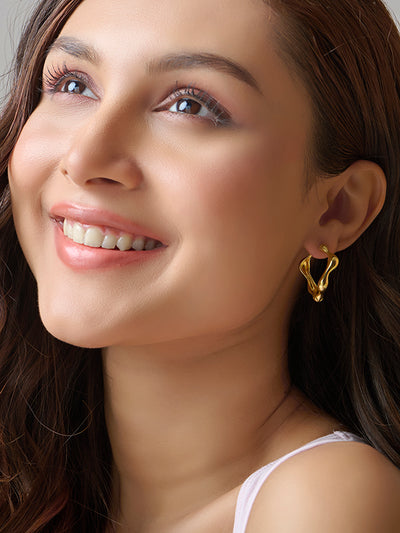 Aurelia Gold Wavy Molten Hoops