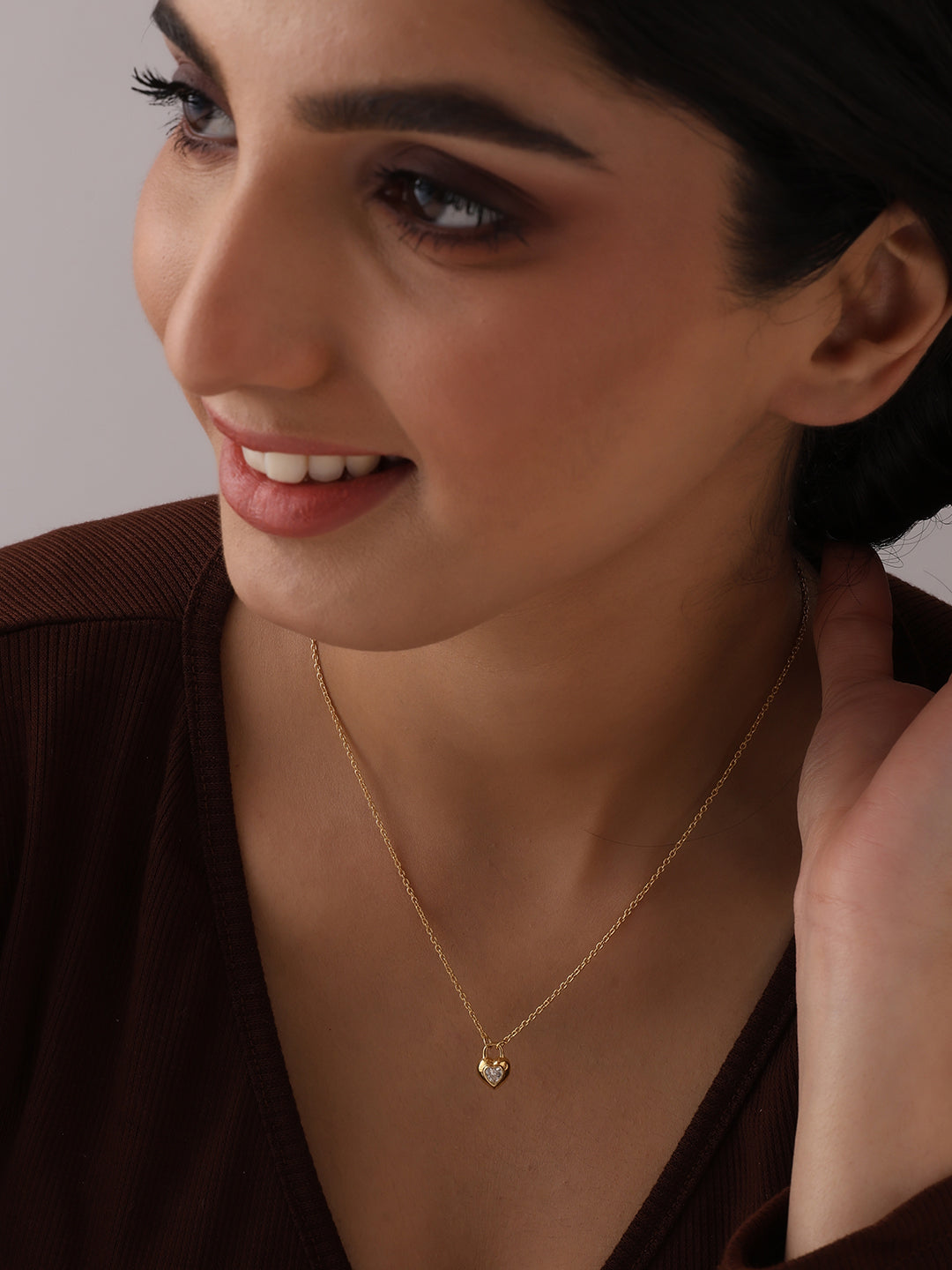 Golden Embrace Heart Pendant Necklace