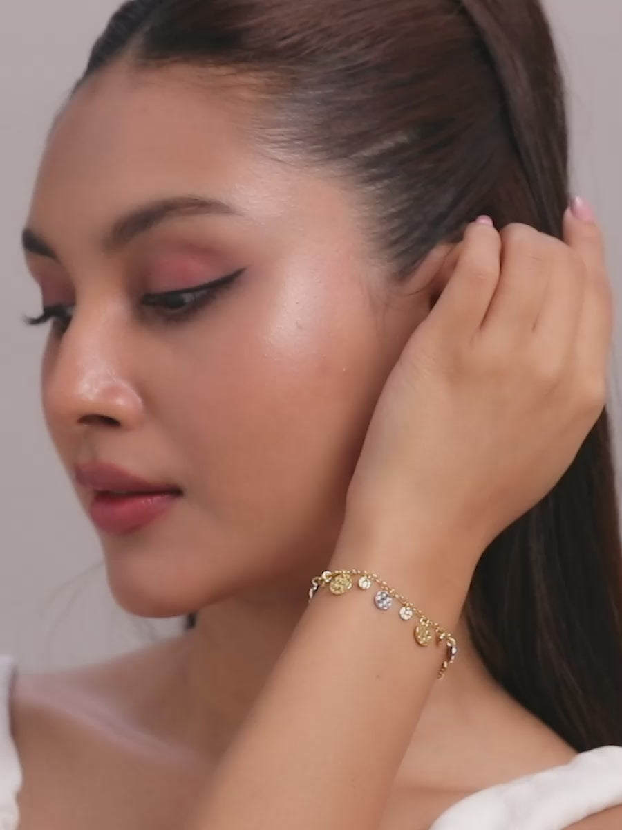 Load video: Radiant Rhythm Two-Tone Hammered Disc Silver Bracelet