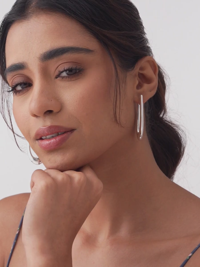 Load video: Elara Sterling Silver Elongated Teardrop Hoops