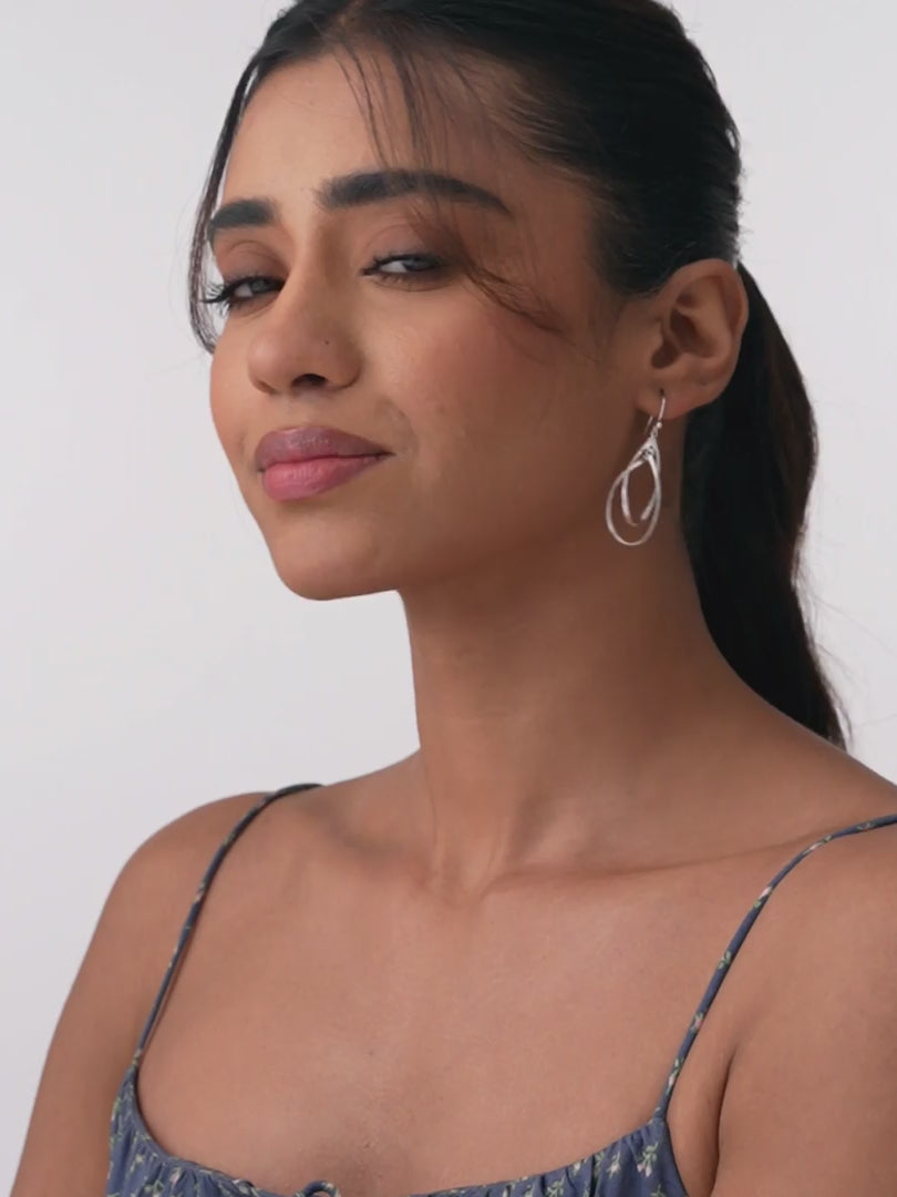 Load video: Double Elongated Oval Twist Drop Earrings
