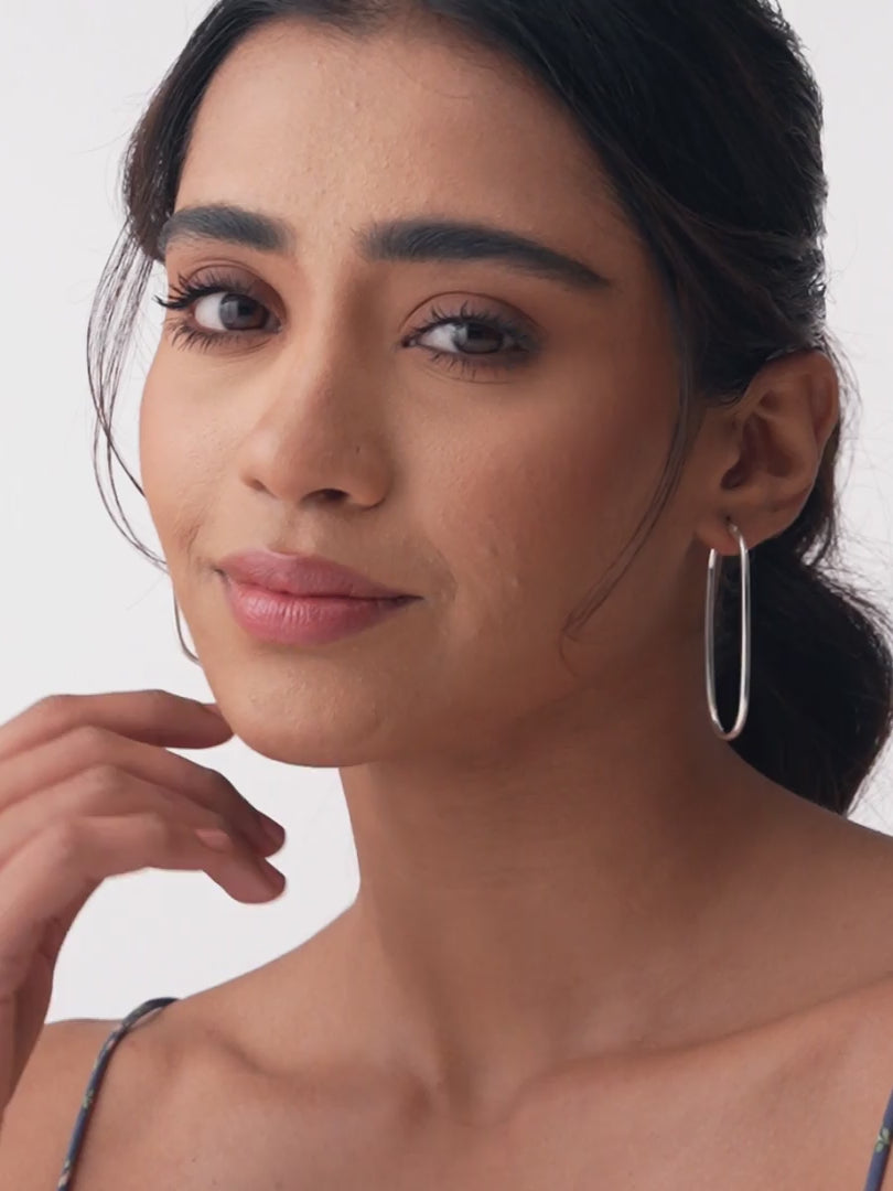 Load video: Elara Sterling Silver Long Oval Drop Hoops