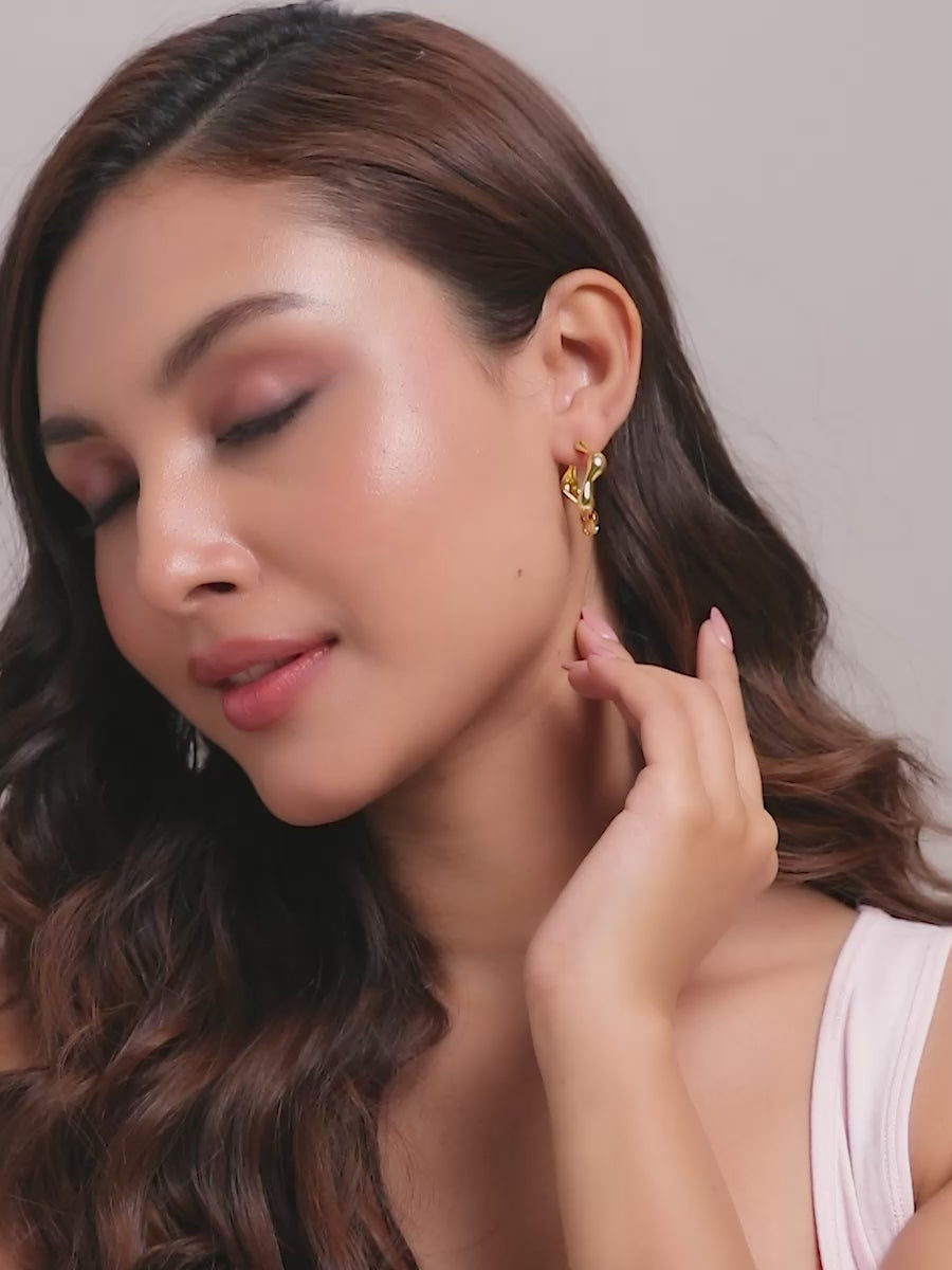 Load video: Aurelia Gold Wavy Molten Hoops