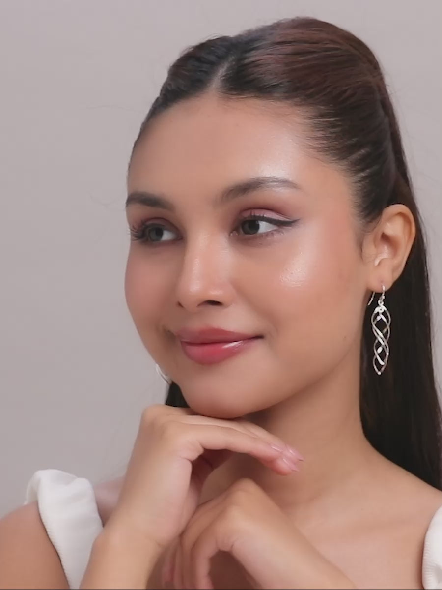 Load video: Double Twisted Marquise Loop Earrings